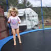 Samantha jumps on the trampoline